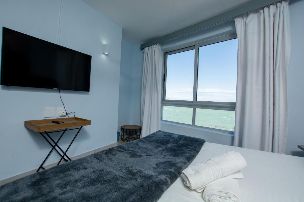 Ocean Breeze Hotel Strand Esterno foto