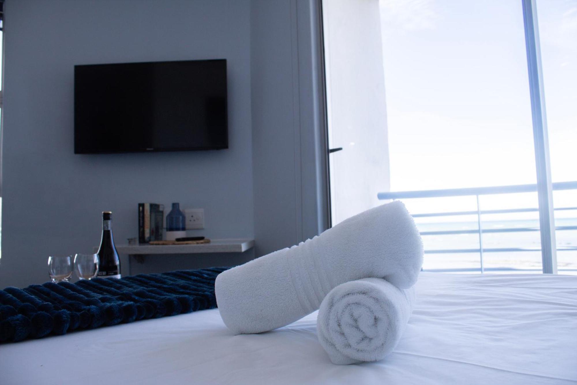 Ocean Breeze Hotel Strand Esterno foto